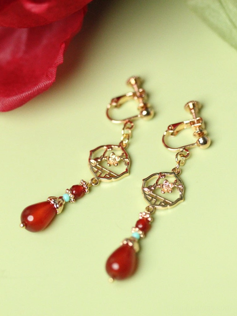 Comfort clip-on festive red agate Chinese earrings with gold lattice flower ornament and teardrop pendant