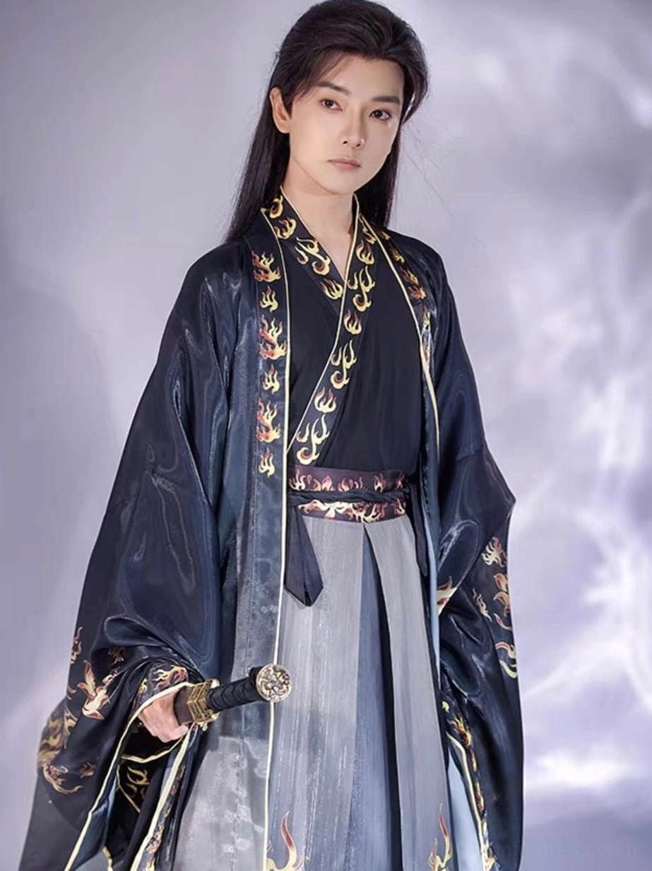 Fire Decree traditional Chinese hanfu for men front view featuring cross-collar top gold flame sleeve details and grey skirt