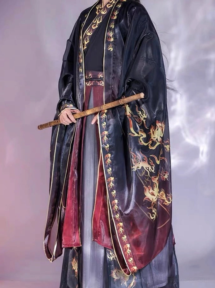 Fire Dragon Fire Decree hanfu for men low front view with black wide-sleeved robe red gradient skirt panels and flute