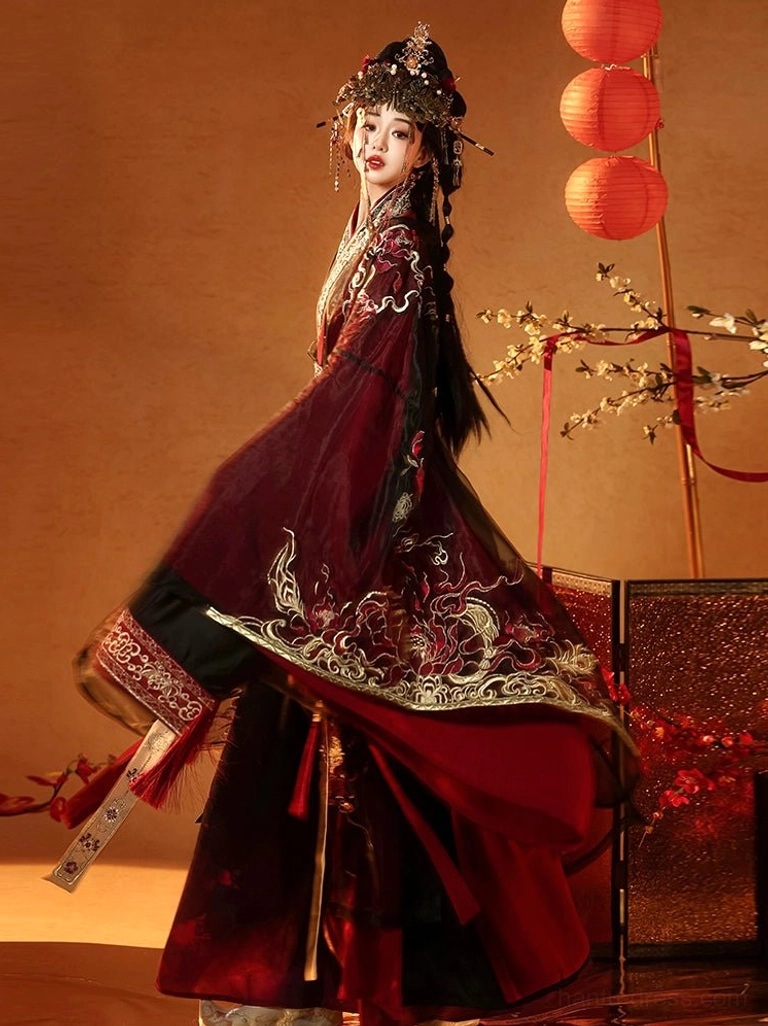 Fire Lotus Han Dynasty inspired bridal hanfu side view featuring embroidered robe hem layered skirt wide sleeves and ceremonial waist styling