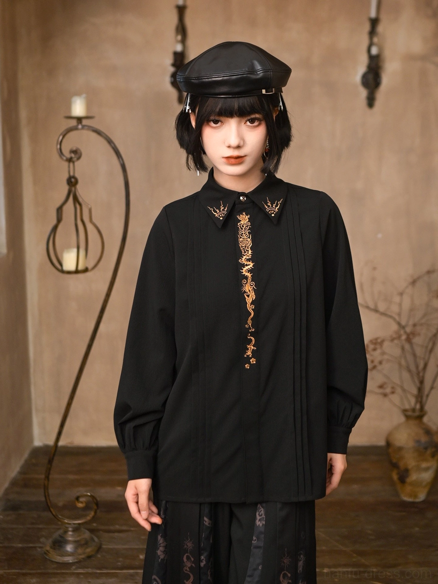 Full-length outfit view of Five Poisons black dragon embroidered modern Hanfu long sleeve top styled with a patterned long skirt