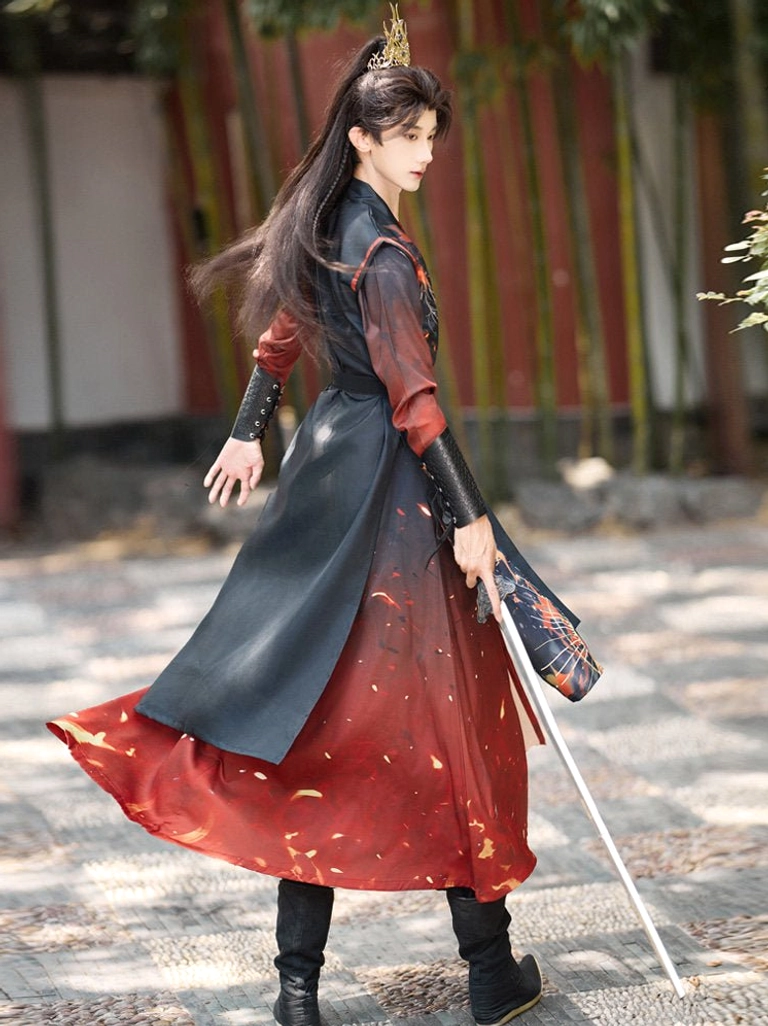 Back three-quarter view of men’s Flame Wuxia Hanfu set with flowing wine red skirt and Chinese fantasy sword styling