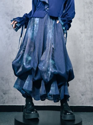 Floating Electric Jellyfish modern hanfu flower-bud skirt close-up showing navy cyan galaxy print gathered bubble hem and side pocket