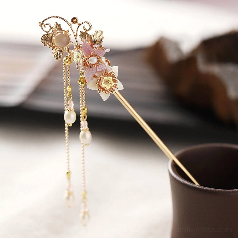 Floral Chinese hair stick with gold metal frame pink resin flower accents gold chains and pearl pendants