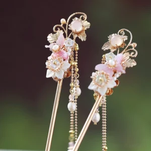 Pair of floral Chinese hair sticks with gold filigree pink and white flowers and long pearl tassels for Hanfu hairstyles