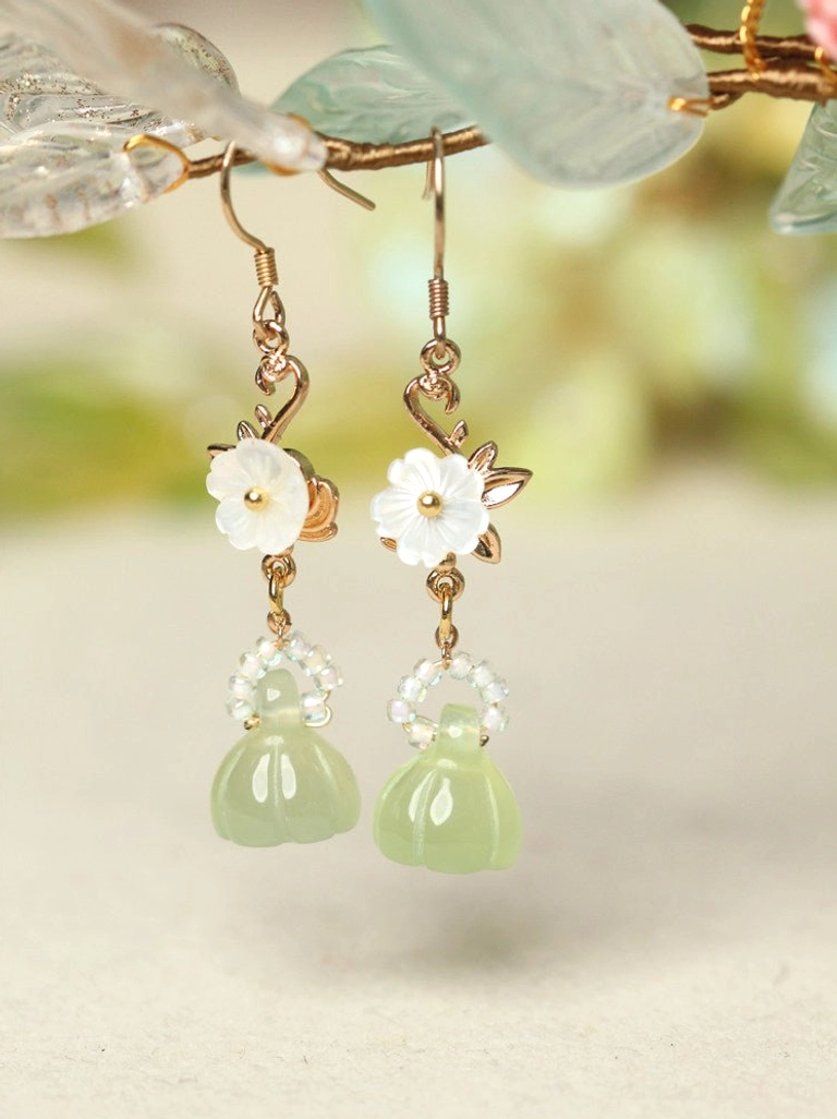 Floral Hanfu earrings with gold hardware delicate white flower ornaments clear bead accents and light green lotus pod pendants