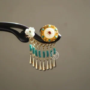 Flowing jade Chinese hair stick product view featuring a dark curved pin shell flower turquoise beads and flowing tassel pendants