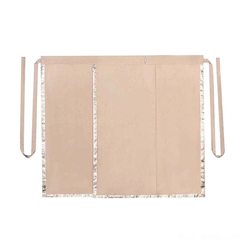 Flat lay view of the Fog Flower Hanfu spiral wrap skirt in solid light tan fabric with high waist, long side ties, and decorative embroidered trim