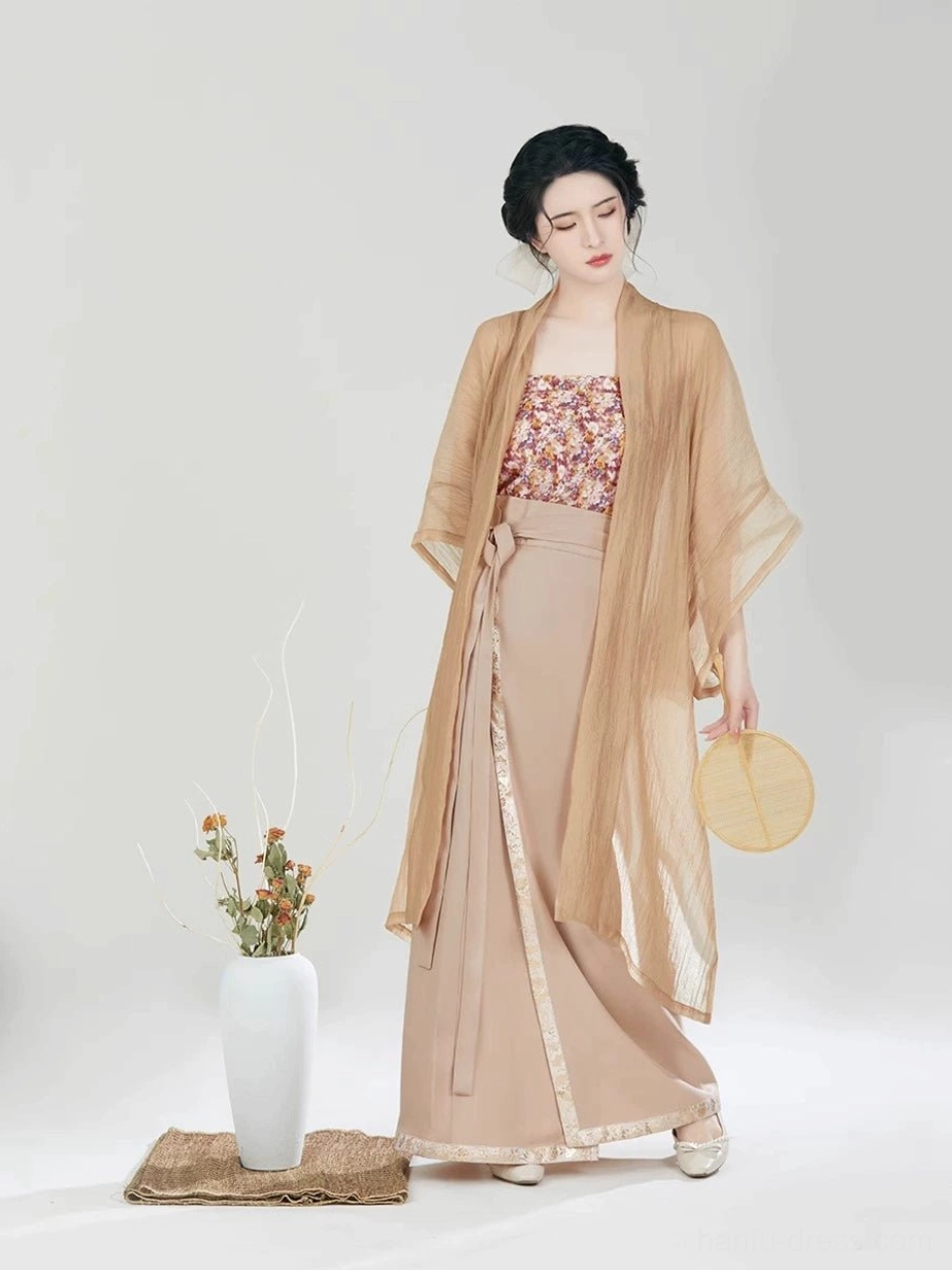 Full-body front view of the Fog Flower Song Dynasty modern Hanfu set with sheer tan Changgan Temple beizi jacket, floral camisole, high-waisted wrap skirt, and wooden round fan