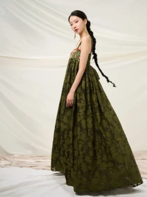 Side view of forest green New Chinese Style floral sundress featuring square neckline wide straps high waist and pleated long skirt