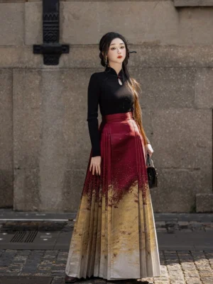 Front view of a pleated Hanfu mamianqun Chinese New Year skirt with elegant burgundy and champagne gradient color on an outdoor street