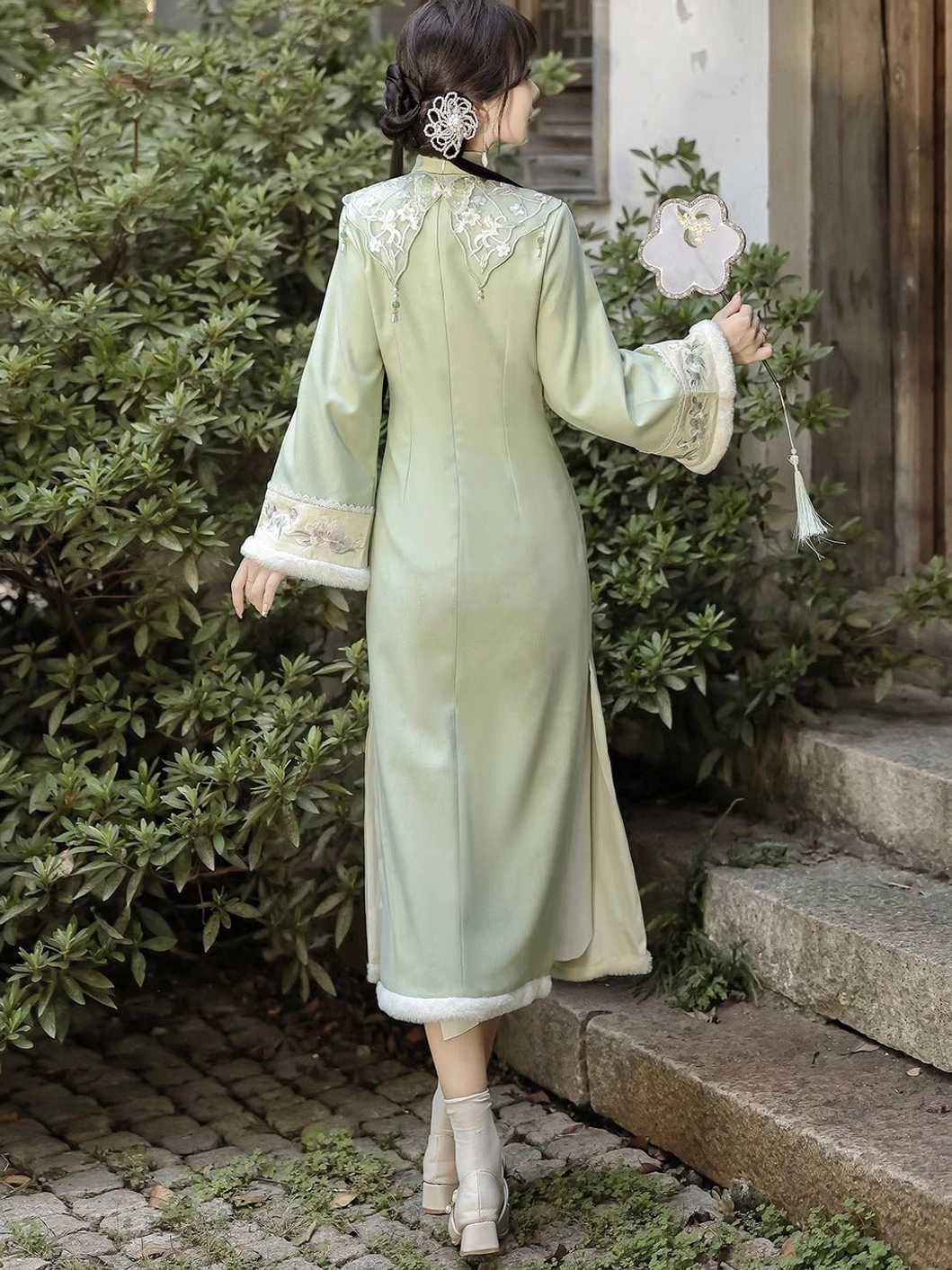 Back view of Frost Butterfly bean green modern cheongsam dress with embroidered back yoke and flared trimmed sleeves