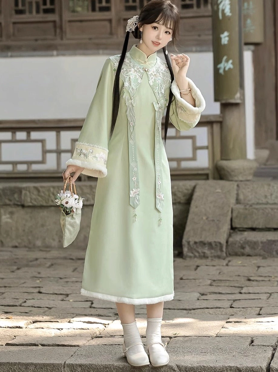Full-length Frost Butterfly modern Hanfu cheongsam dress styled with traditional Chinese hair accessories and embroidered handbag