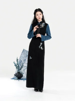 Front full-body view of Garden Butterfly embroidered modern Chinese qipao dress with two-tone color blocking, stand collar, long sleeves, floral embroidery, butterfly details, and floor-length fitted silhouette