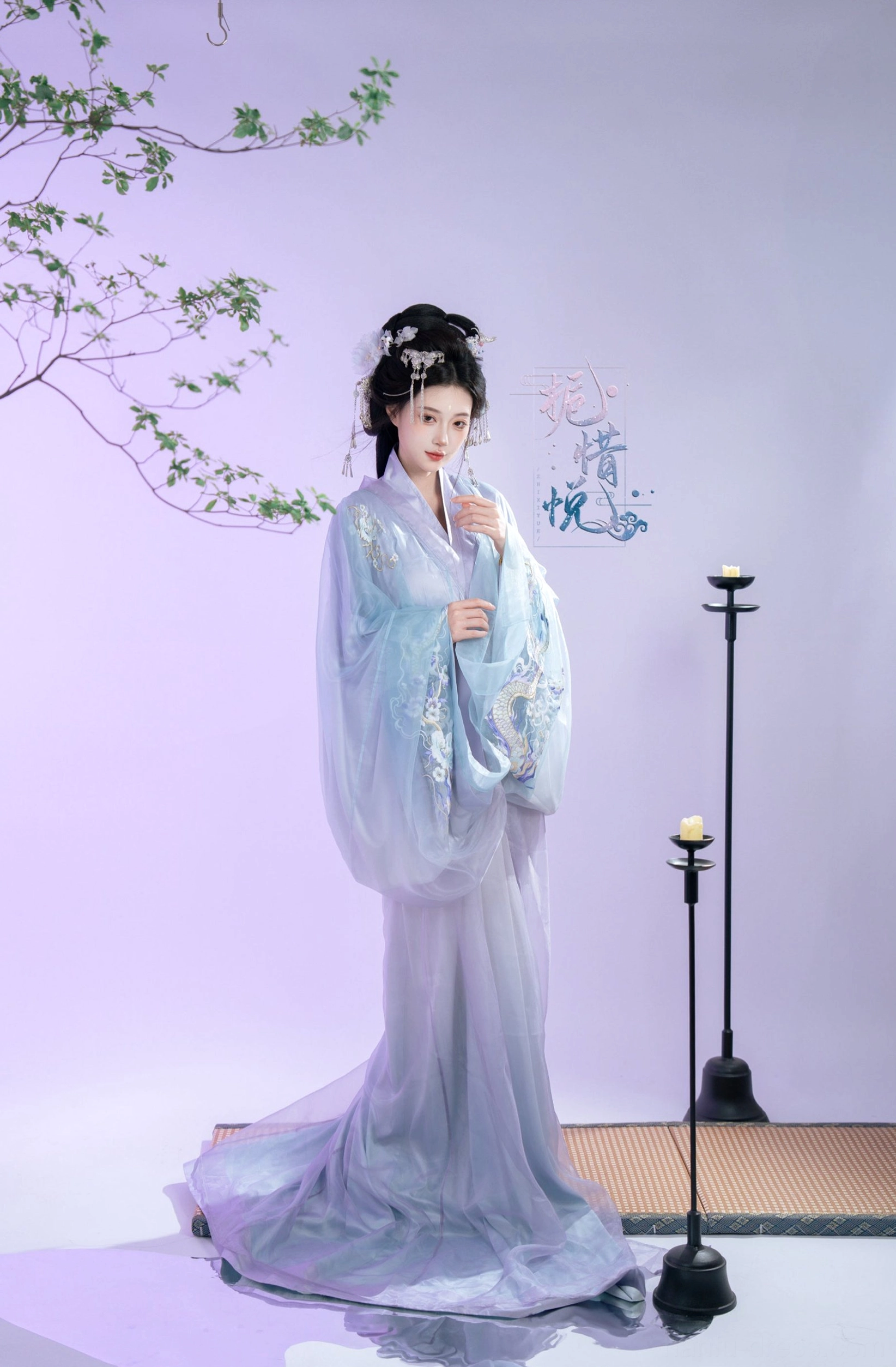 Front view of Gardenia Warring States inspired Han Dynasty Hanfu with light blue cross collar robe, lavender skirt, embroidery, and floor length hem