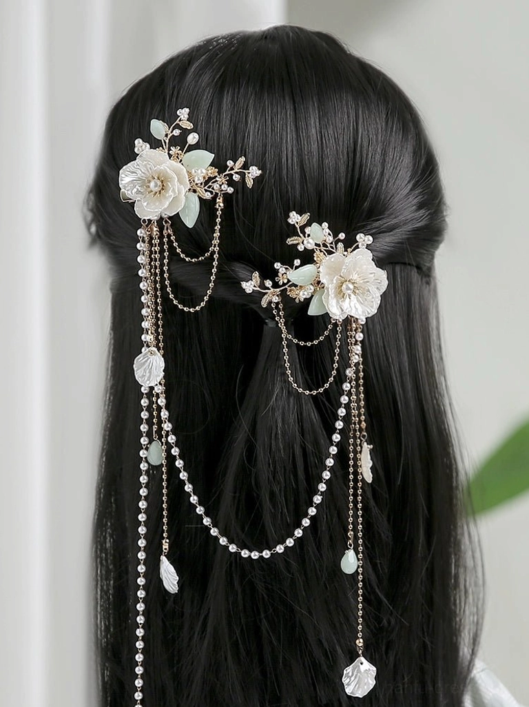 Gardenia tassel back hair pin worn on a mannequin half up hairstyle for Hanfu bridal and qipao styling