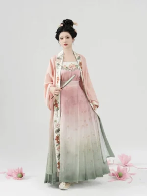 Three-quarter view of Glaze Red Song Dynasty Hanfu set featuring floral embroidered outer beizi and flowing pleated gradient skirt