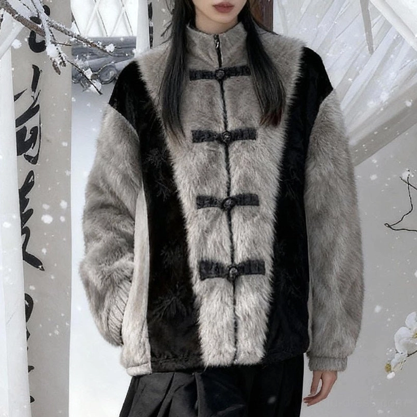 Close-up of a Golden Bamboo Leaf Chinese-style faux rabbit fur jacket highlighting the stand collar, decorative frog buttons, soft grey faux fur, and black contrast panels