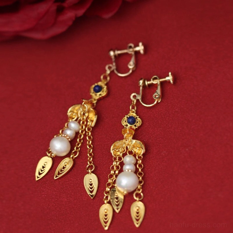 Comfort clip-on Hanfu tassel earrings with golden gourd inspired design, pearl chains, blue accents, and textured leaf pendants