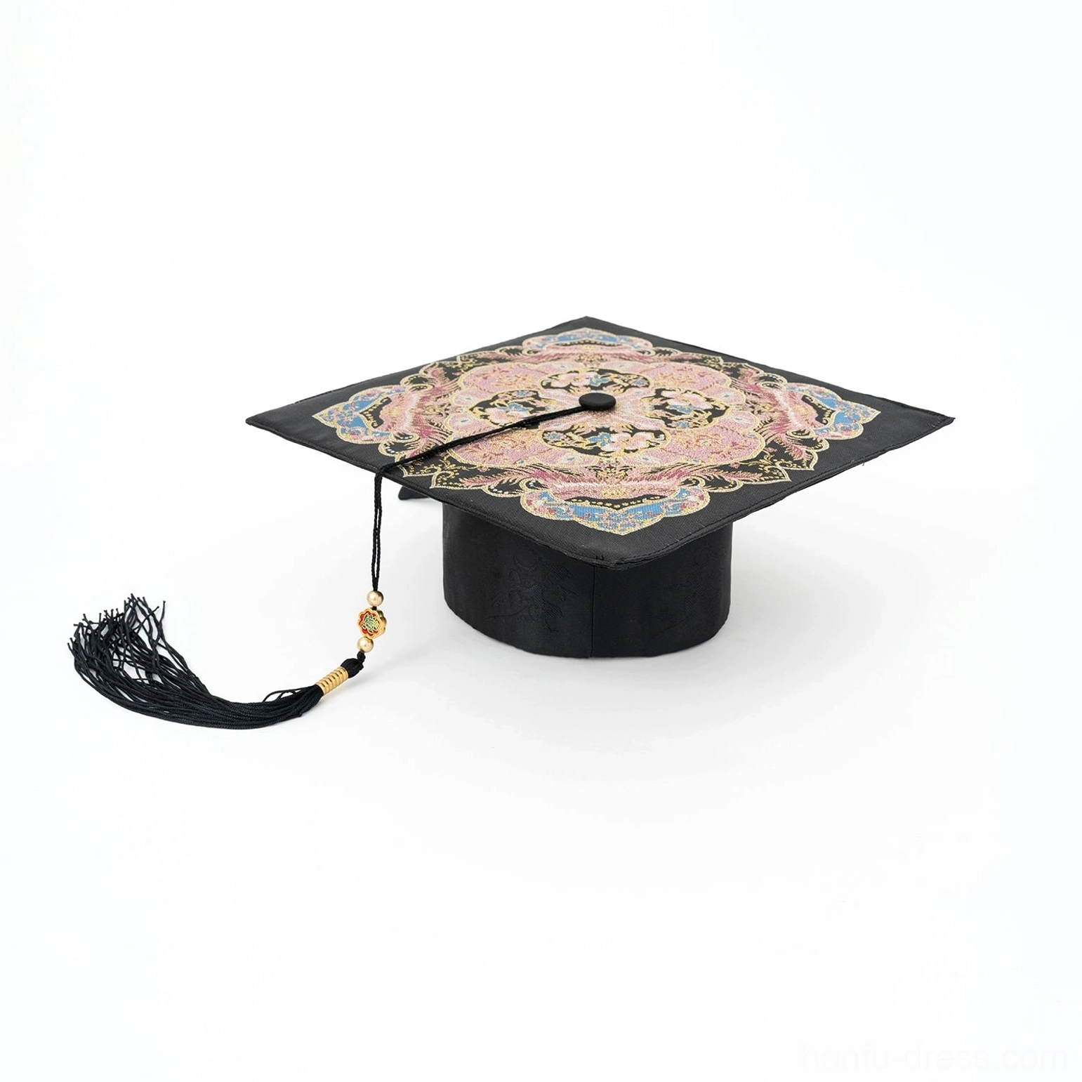 Black embroidered traditional Chinese graduation hat with gold pink and blue floral motifs and tassel