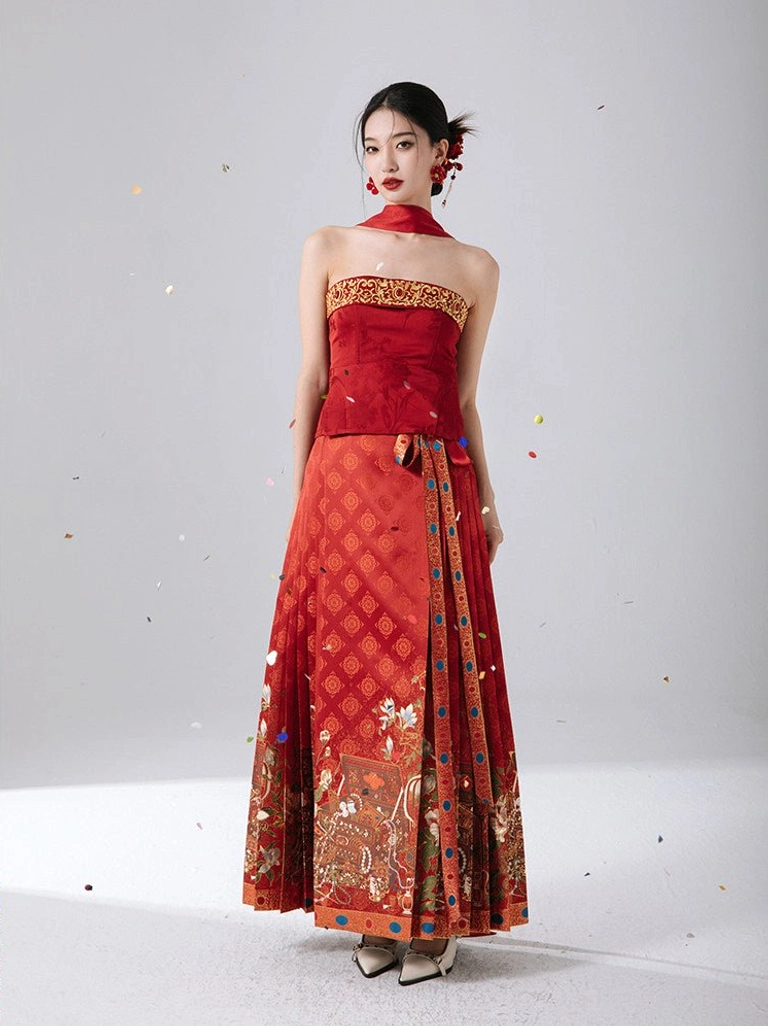 Three quarter front view of red Chinese style festive bustier with gold trim and jacquard texture, styled for a Lunar New Year tea ceremony outfit