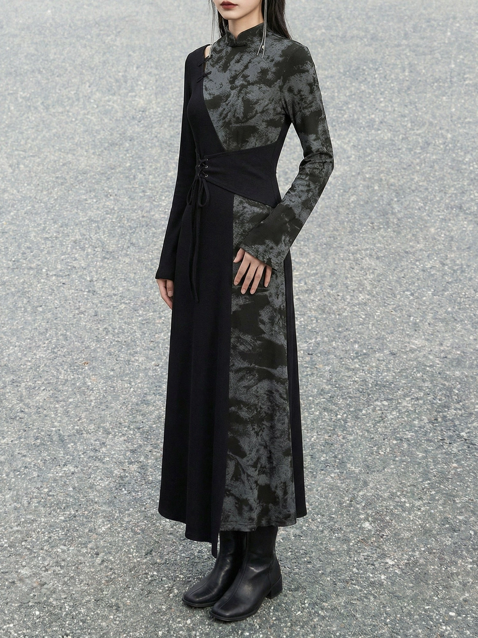 Three-quarter view of a gothic modern Hanfu long dress with high stand collar, corset-inspired lace-up waist, two-tone panels, long sleeves, and floor-length skirt