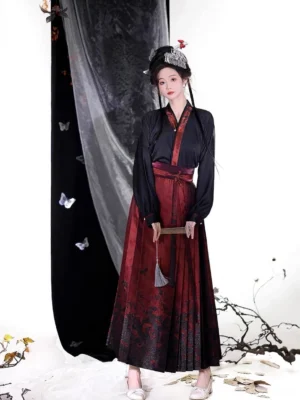 Full front view of Gothic modern Ming style Hanfu with black cross-collar top and wine red patterned mamianqun horse face skirt