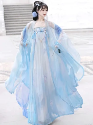 Gradient blue Tang Dynasty Hanfu Qixiong Ruqun dress shown from a three-quarter view with flowing sheer sleeves and delicate chest jewelry