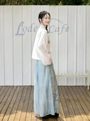 Green Chord modern Song Dynasty Hanfu outfit side and back view showing flowing flight sleeves and blue wide-leg pants