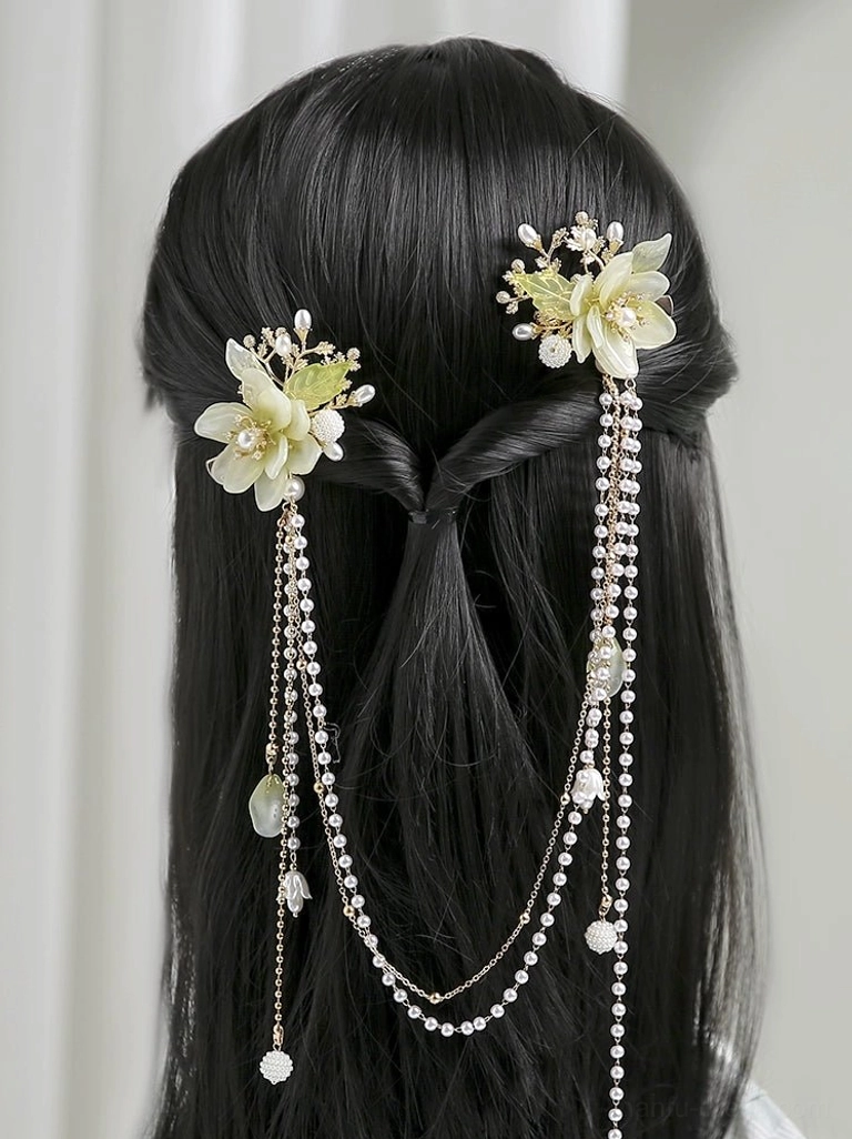 Pale yellow green floral Hanfu back hair accessory worn with half tied black hair and long pearl tassels