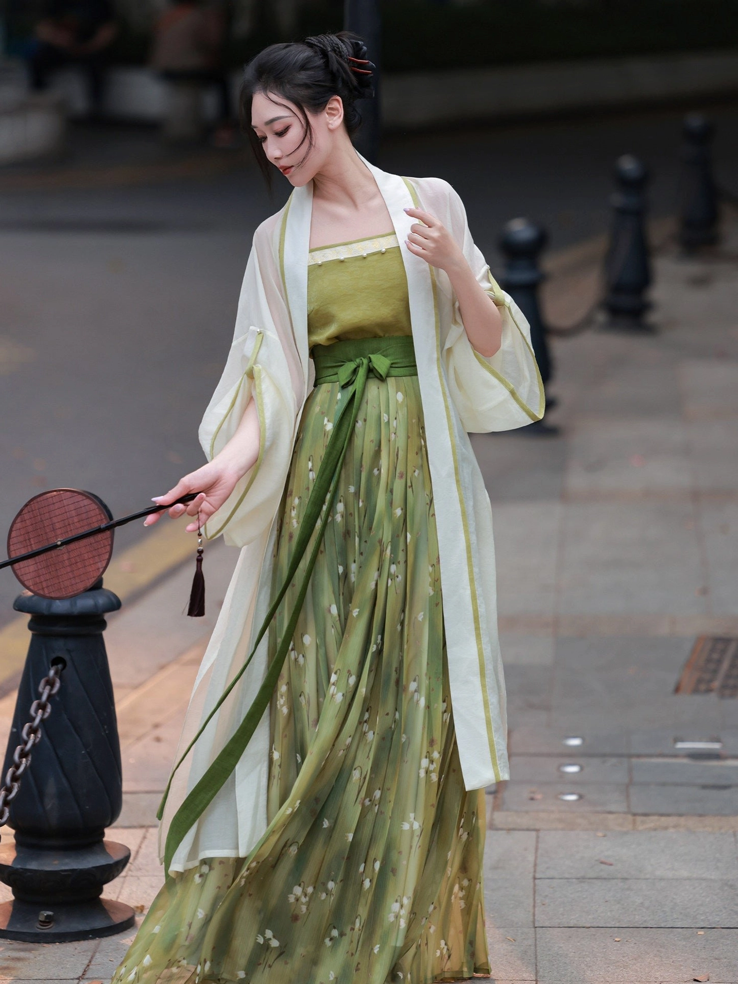 Green floral Song Dynasty Hanfu three-piece set with sheer ivory cardigan, green camisole, pleated wrap skirt and round fan