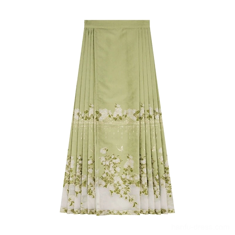 Green pleated mamianqun horse face skirt with floral and water-inspired prints light blue hem trim and solid green upper panel