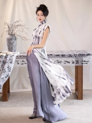 Side view of a grey ink-wash tie-dye cheongsam top with lavender high-waisted floor-length skirt in modern Chinese style