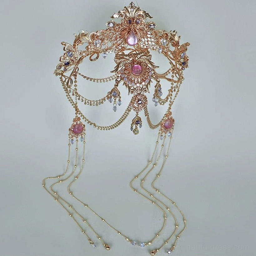 Full Hanfu crown accessory shown in a flat lay, with ornate gold filigree, multiple pink-purple crystal accents, and long double-layered chain tassels