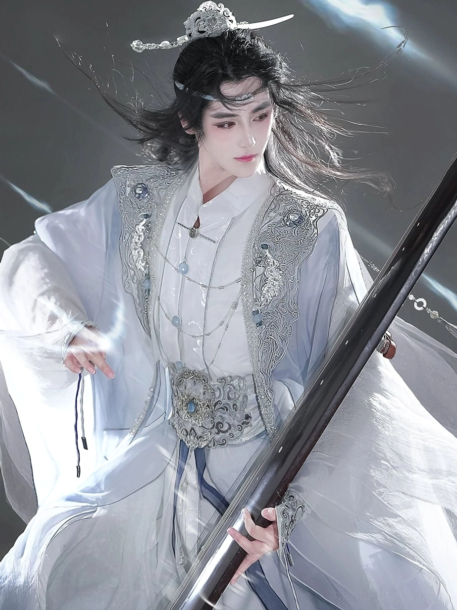 Dynamic upper-body view of Hanfu for men with a silver embroidered vest, layered neck accessories, ornate silver waist buckle, loose sleeves, and traditional hair ornament