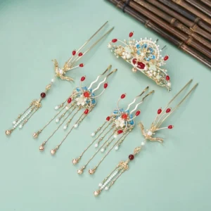 Hanfu hair accessories set displayed flat with gold-tone Chinese hair ornaments, blue cloisonne-inspired decorations, red beads, faux pearl tassels, and jade-like accents