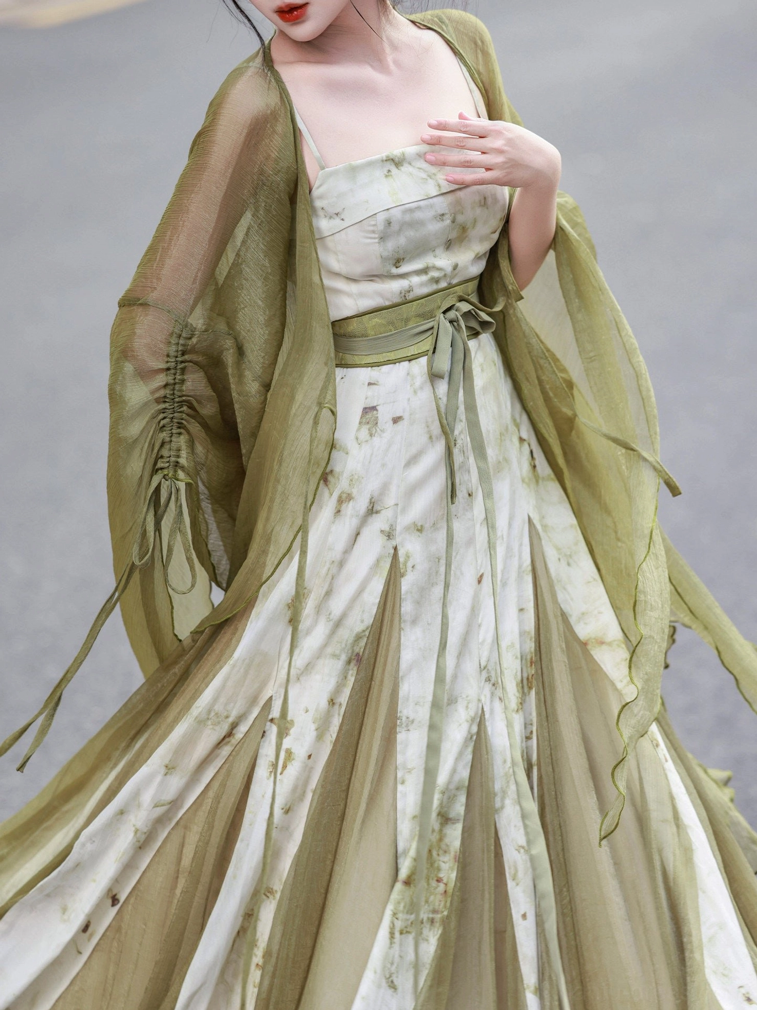 Close up of Hanfu inspired swing dress tube neckline waist sash olive sheer cardigan front tie and adjustable drawstring cuffs