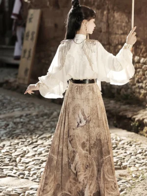 Back view of Heavenly Envoy Hanfu outfit showing the white long sleeve top, exposed back styling, waist tassel, black belt, and printed khaki horse face skirt