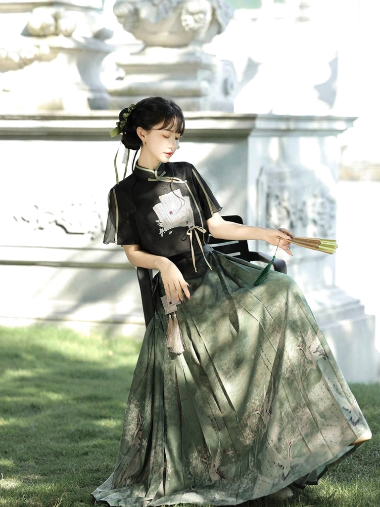 Herbalism Hanfu crop top and dark green horse-face skirt styled as a traditional Chinese outfit in natural sunlight