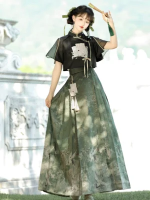 Modern Ming Dynasty Hanfu crop top and dark green mamianqun horse-face skirt worn in a classical Chinese garden with tassel pendants