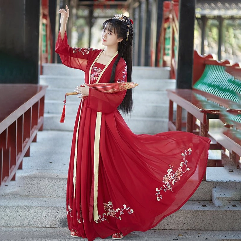 Red Song Dynasty qiyao ruqun Hanfu complete set with embroidered floral skirt and wide sleeves, styled with red oil-paper umbrella