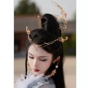 Side view of Holy Moon Hanfu crescent hair crown and forehead headdress styled on a traditional high bun hairstyle