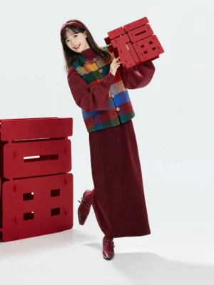 Modern Song Dynasty hanfu Chinese New Year dress set with wine red maxi dress and colorful rainbow plaid vest styled with burgundy accessories in a festive studio