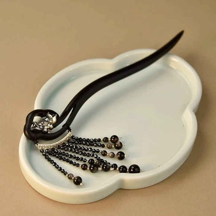 Detachable Chinese tassel hair stick components showing ebony hairpin silver lotus ornament and black bead tassel
