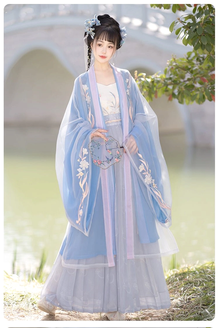 Indigo Blossoms Song Dynasty Qiyao Ruqun Hanfu set front three-quarter view with blue embroidered wide-sleeve top and lavender wrap skirt