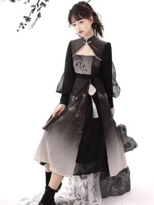 Three-quarter view of modern Hanfu midi dress with stand-collar-inspired neckline, sheer black sleeves, ink flower embroidery, tassel detail, and gradient skirt