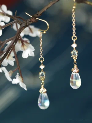 Iridescent crystal drop Chinese earrings hanging from a flowering branch with gold-tone hooks and delicate cubic zirconia-style accents