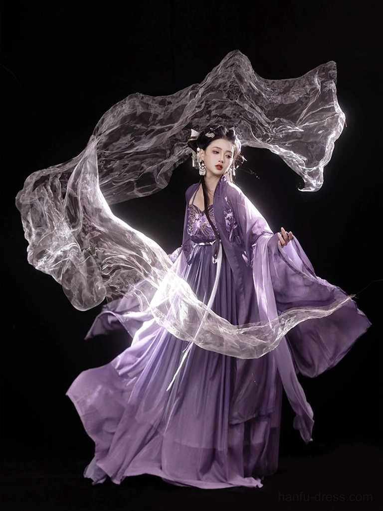 Front full-body view of a woman wearing an Iris Butterfly purple Tang Dynasty Hanfu dress Heziqun set with embroidered bustier, flowing chiffon coat, wide sleeves, and floor-length skirt
