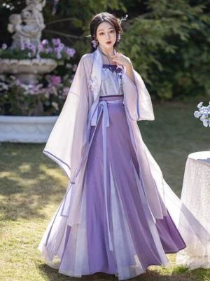 Iris purple Song Dynasty Hanfu full set with lavender cardigan, embroidered camisole and flowing ten-panel wrap skirt in a sunlit garden