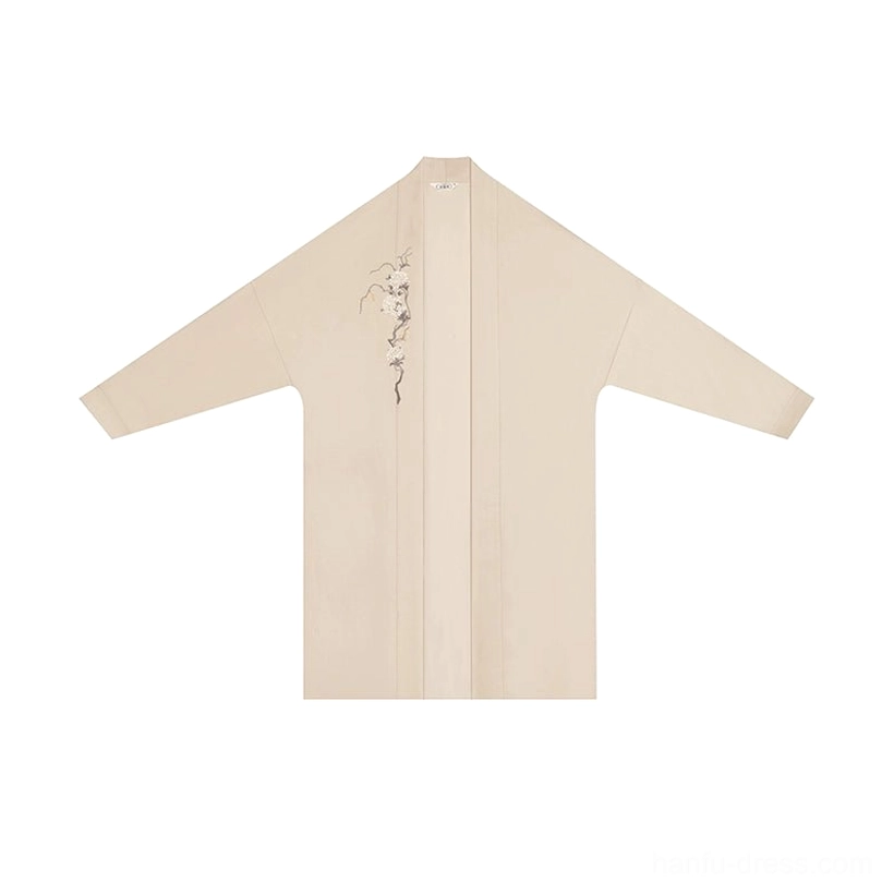 Ivory embroidered modern Hanfu outer jacket flat lay with cross collar inspired shape and subtle floral chest embroidery